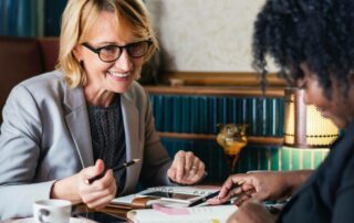 woman talking to her co-worker