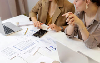coworkers speaking about budgeting and planning